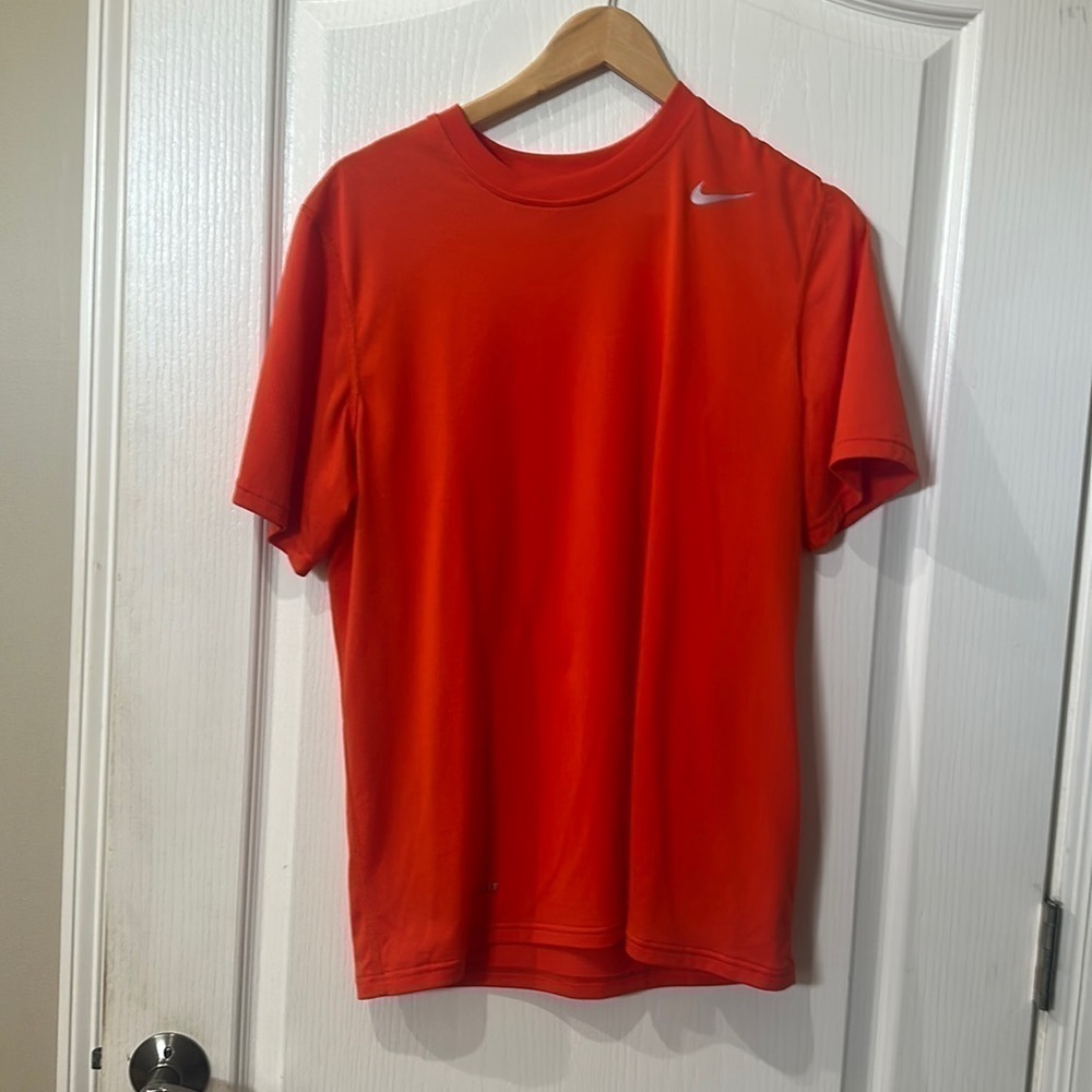 Nike size medium, short sleeve, orange , athletic T-shirt